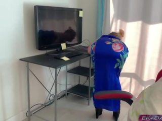 Stepmom gets stuck in a desk and stepson fucks her